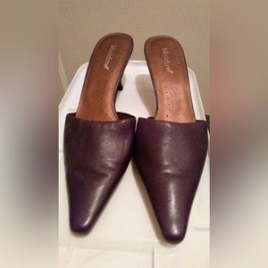 Egg-plant colored mid-heeled, open back pump